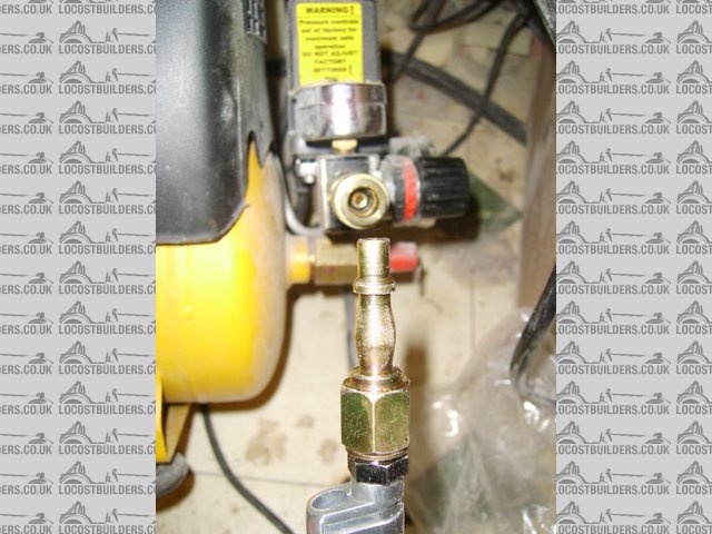 Rescued attachment compressor with fitting.JPG